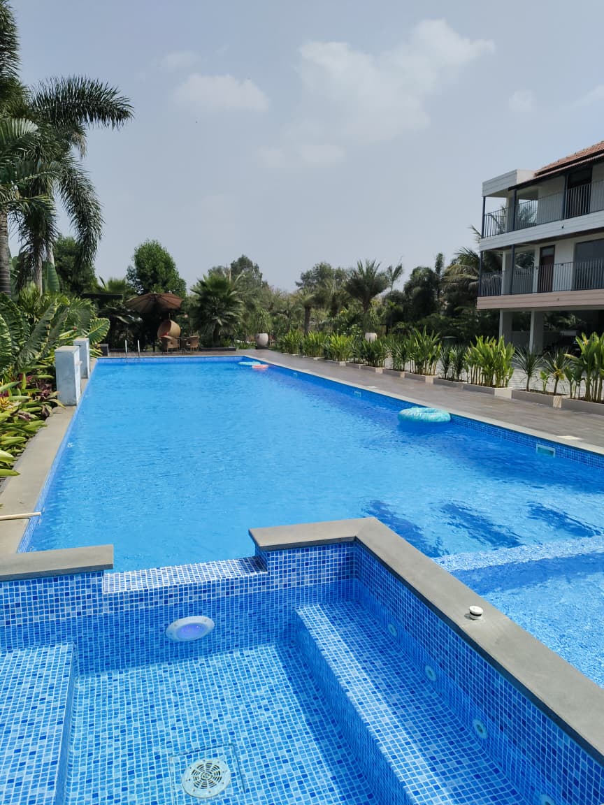Luxury Farmhouse Pool Construction: 25ft x 80ft with Jacuzzi & Kids Section